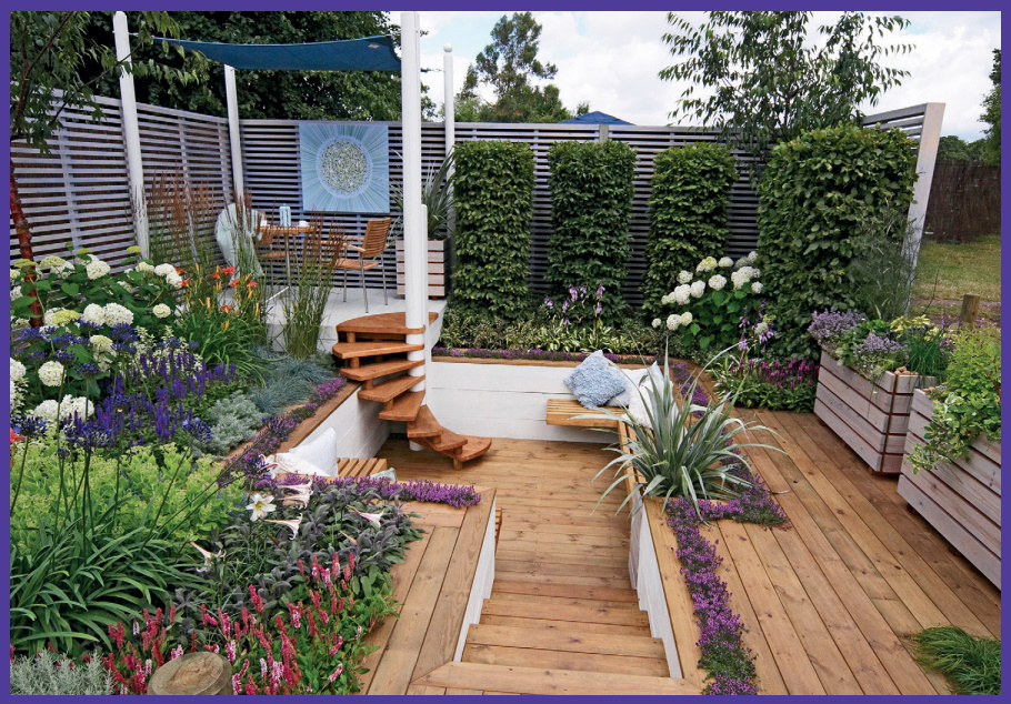 Beautiful garden with decking, plants and dining area.